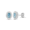 9ct white gold 25pt Natural Diamond and blue topaz stud earrings.
