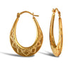 9ct yellow gold pear-shaped Diamond Cut creole earrings.